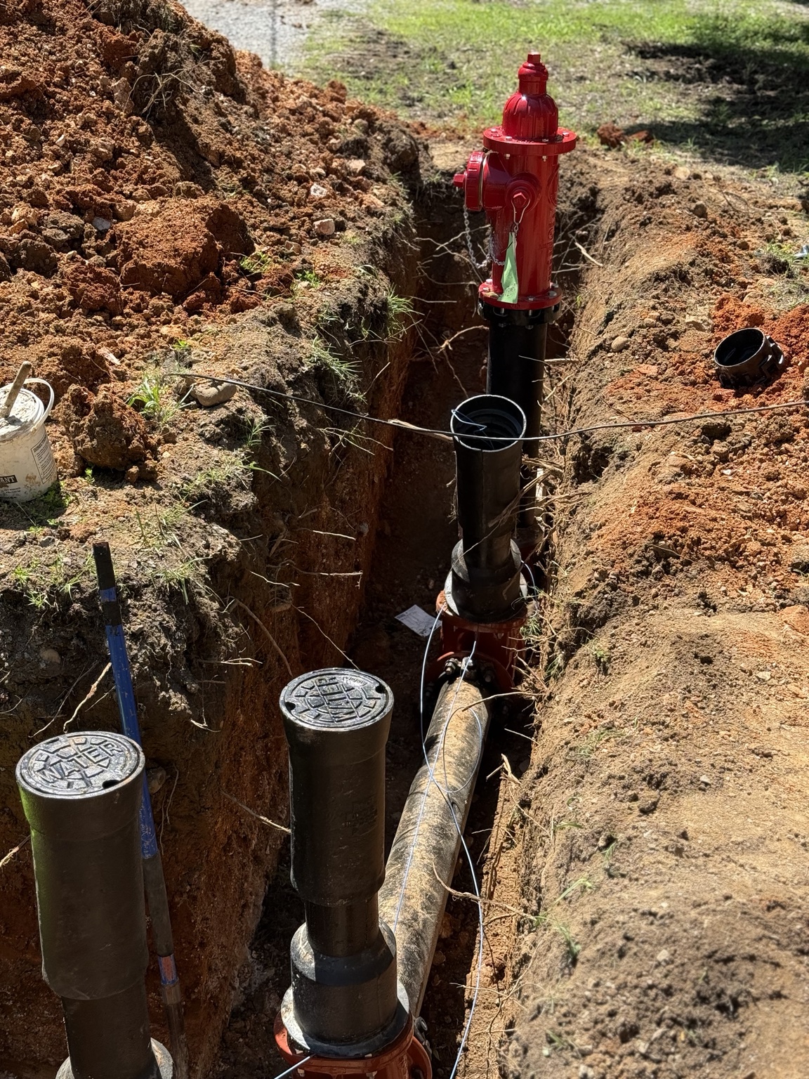 Water main installation by Black Rock Excavating